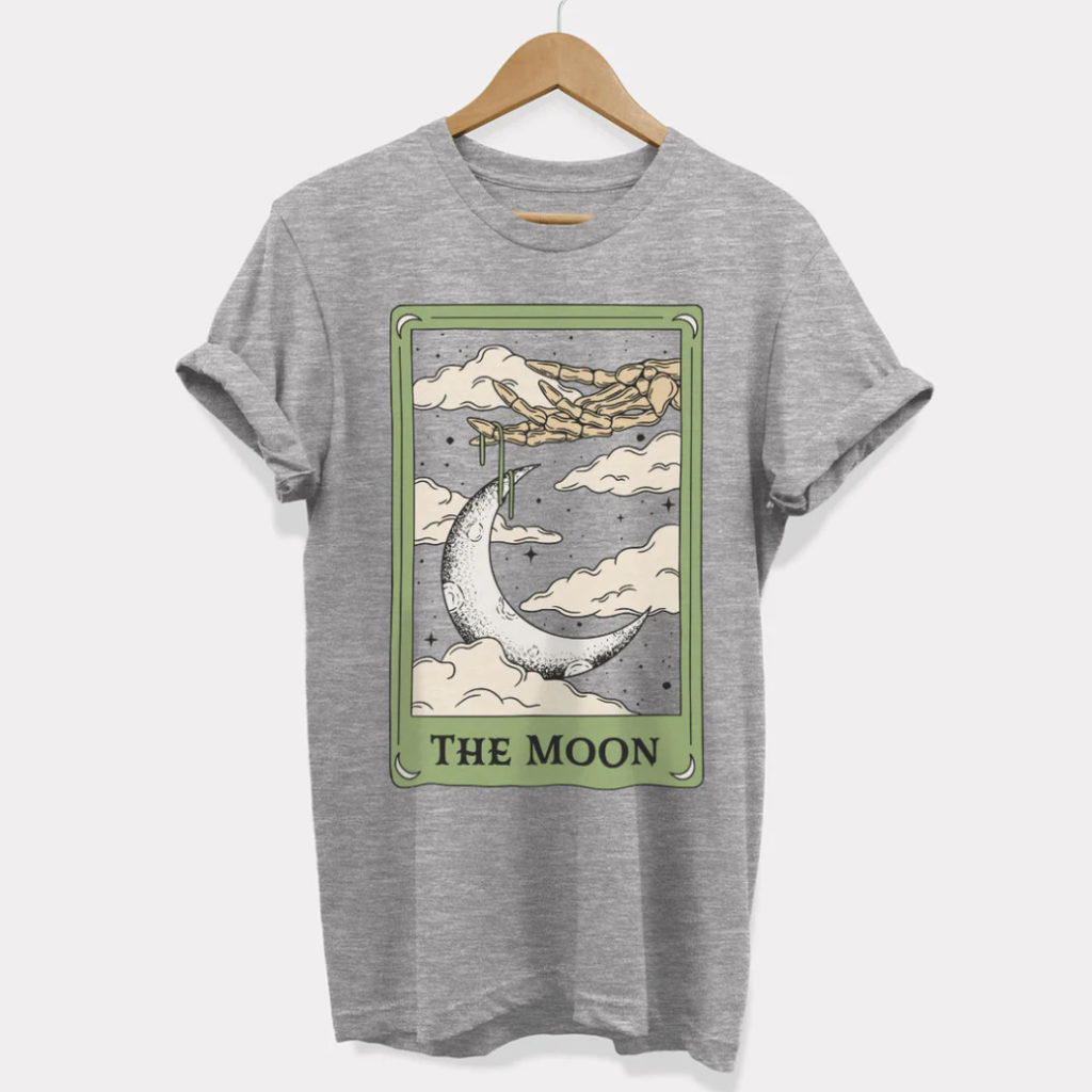 A grey t-shirt with The Moon Tarot Card design