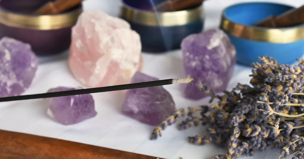 Crystals going through cleansing via incense smoke