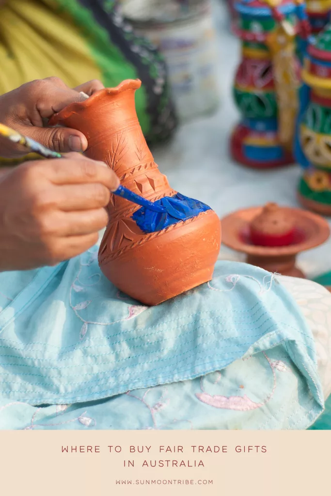 Person hand-painting vase | Fair Trade gifts Australia